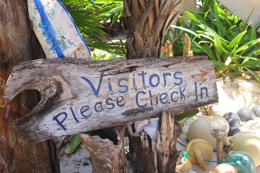 Visitors check in sign